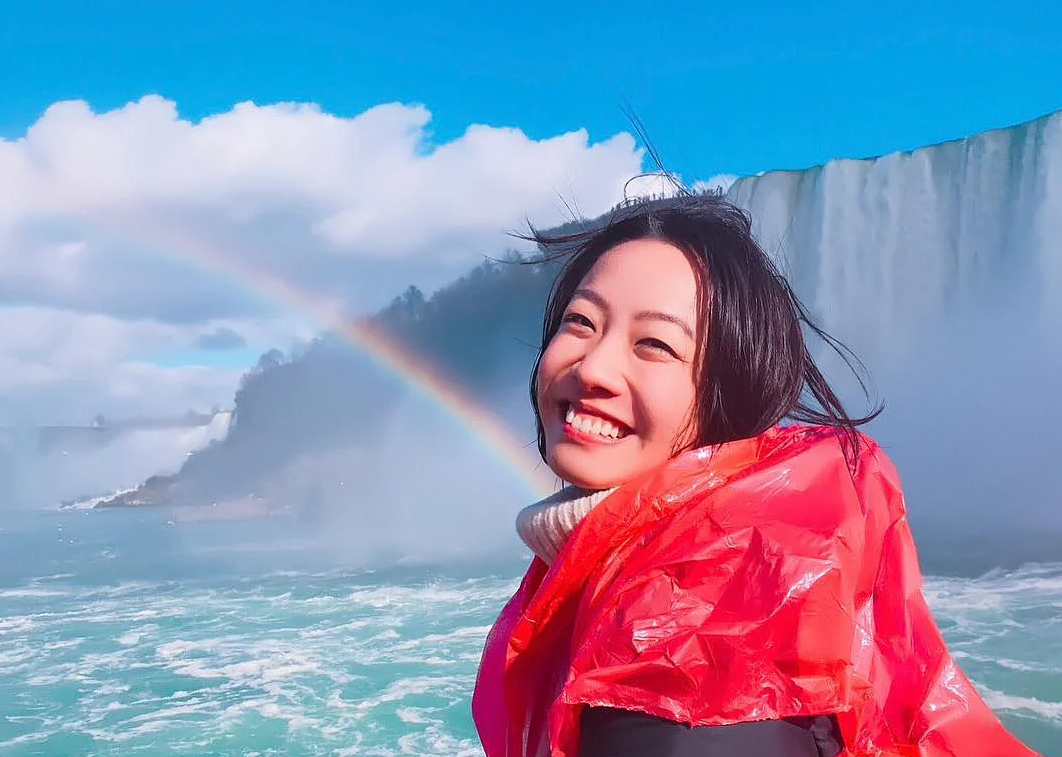 july sunny day at nigara falls up close of person